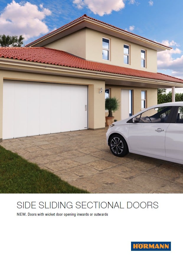 Side sliding sectional doors by Hormann, showcasing a modern design and smooth operation.
